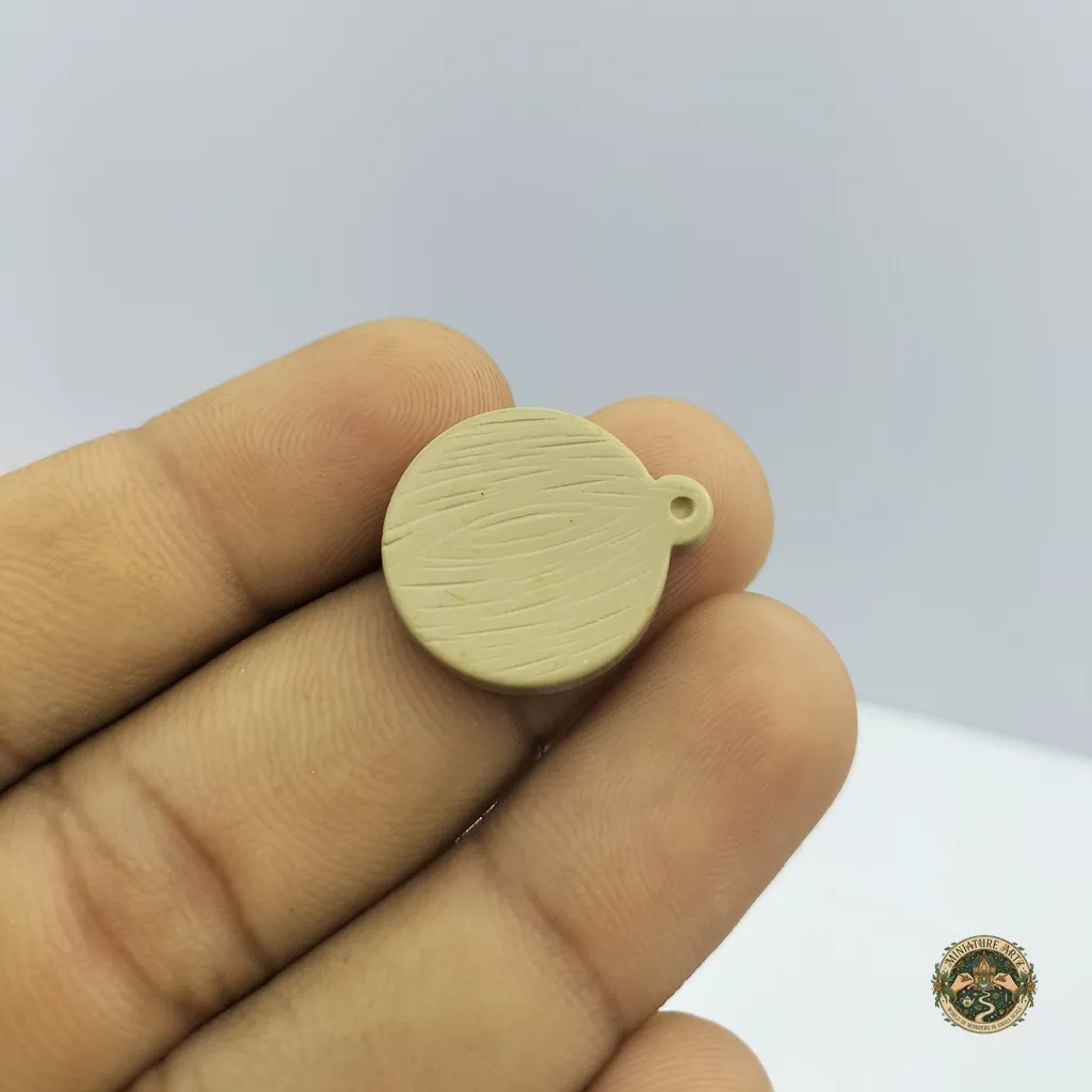 miniature-chopping-boad-1 A wooden miniature cutting board product showcasing its wood grain and surface for dollhouse kitchen displays.