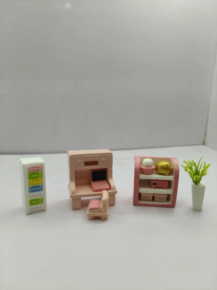 Modern miniature computer desk set product with a sleek table, matching chair, and laptop for a 1:12 scale dollhouse office.