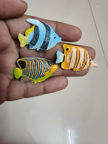 Highly detailed, hand-painted miniature fish figurine product for dollhouse scenes or dioramas.