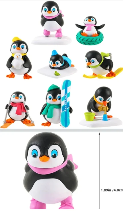 Miniature product of a penguin playing happily in a snowy landscape, ideal for collectors and dioramas.