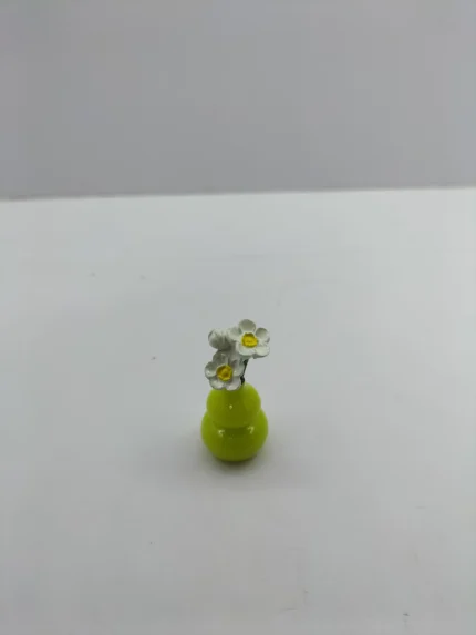 A collection of miniature flower vase decor product showing various handcrafted ceramic styles on a clean, white background.