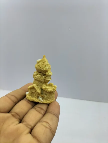 A detailed miniature sand house product with a realistic sandy texture and small windows, designed for beach-themed dioramas.