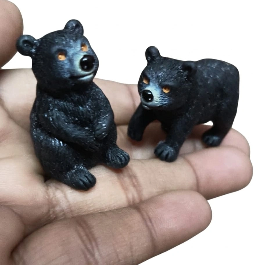 Black-Bear-Cub-Miniature-Figurine Adorable product: set of two black bear cub miniature figurines, perfect for nature display or collection.