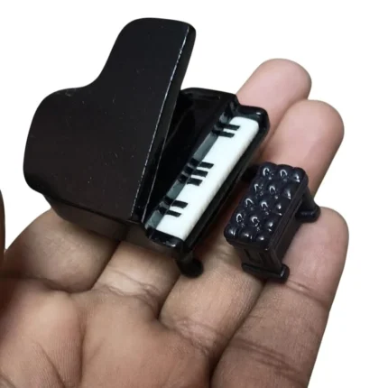 Exquisite black grand piano and bench dollhouse miniature set. A finely crafted product adding elegance.