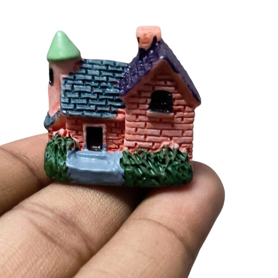 Brick-House-with-Turret-Resin-Miniature-Figurine-1 A detailed resin miniature brick house product featuring a charming turret, perfect for fairy gardens or display.