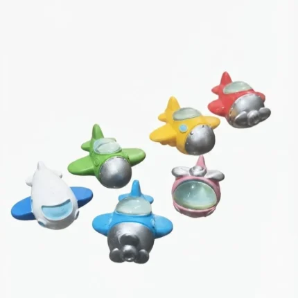 Vibrant, randomly selected cartoon airplane resin miniature figurine product, perfect for playful collections.