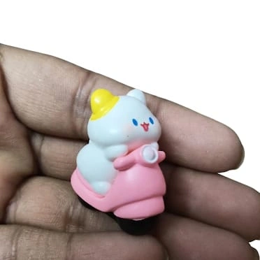 Adorable chubby cartoon bunny figurine product in pink outfit, perfect for any miniature collection.