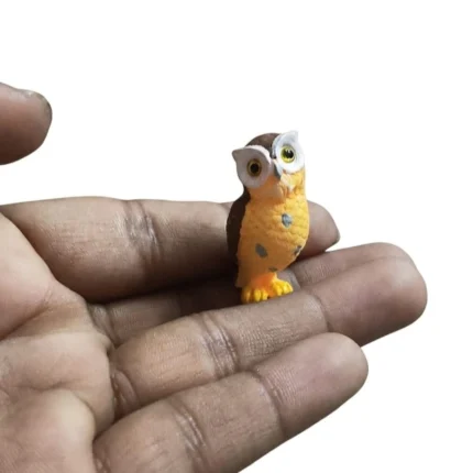 Dark brown resin miniature owl figurine product, detailed for dollhouse or fairy garden display.