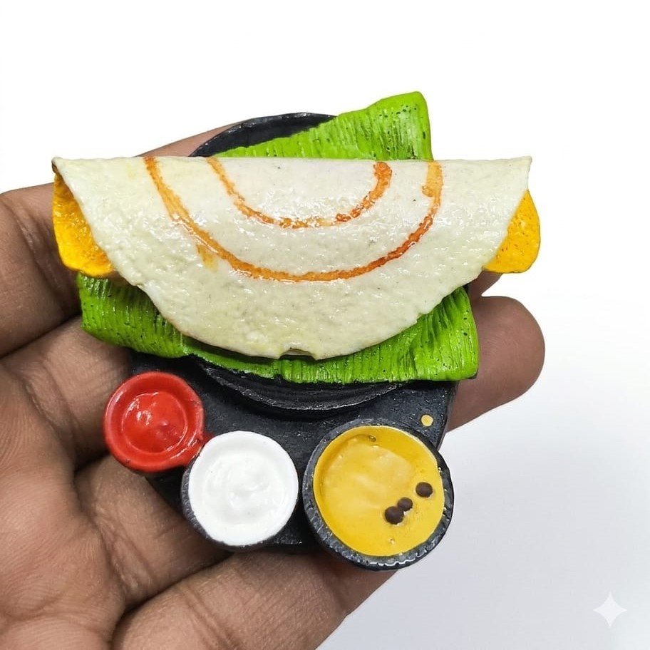 Dosa-with-Banana-Leaf-and-Chutneys-Miniature-Fridge-Magnet Handcrafted miniature dosa fridge magnet, realistic banana leaf meal with chutneys. A delightful decorative product