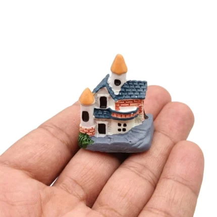 Detailed resin fairy tale castle miniature product, perfect for display or collection, adding magic.