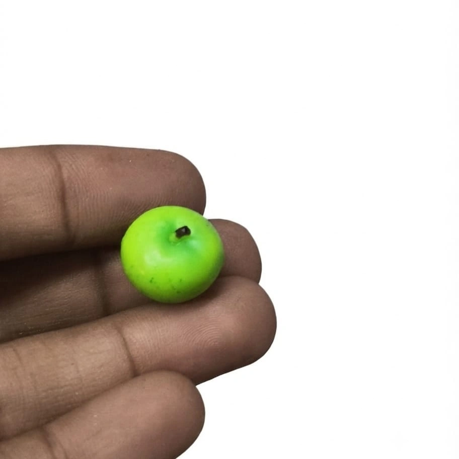Green-Apple-Dollhouse-Miniature-Fruit-Figurine Vibrant green apple dollhouse miniature fruit figurine, a realistic product for miniature scenes or collections.