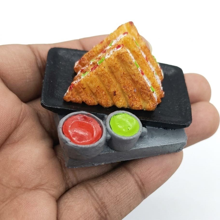 Grilled-Sandwich-with-Dipping-Sauces-Miniature-Fridge-Magnet This product is a realistic miniature grilled sandwich fridge magnet, artfully crafted with two dipping sauces.