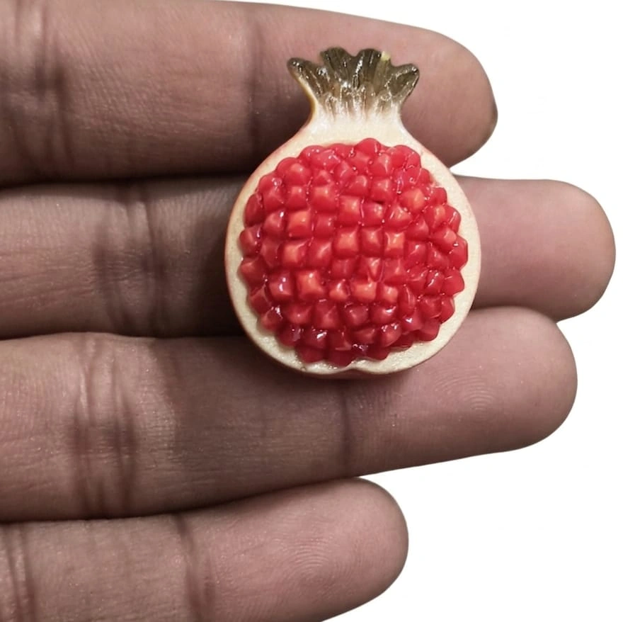 Halved-Pomegranate-Resin-Miniature-Figurine Detailed halved pomegranate miniature figurine, a resin product for dollhouse kitchens or food displays.