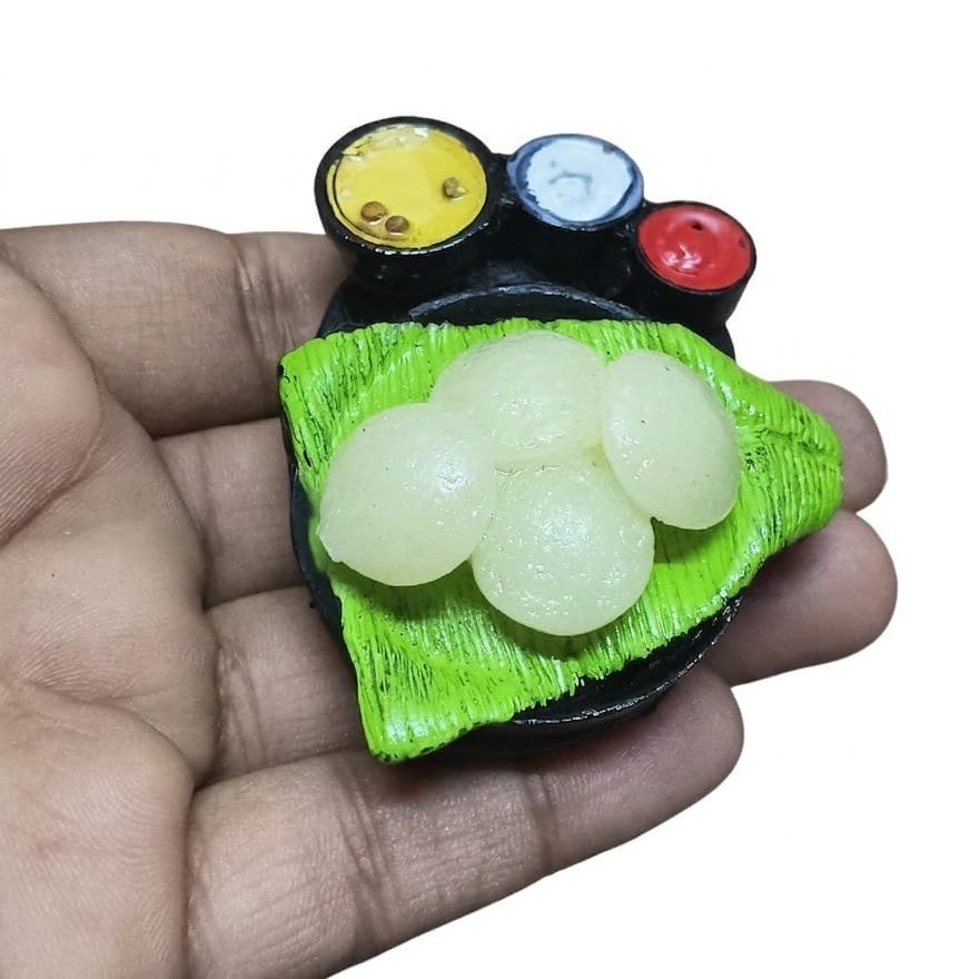 Idli-with-Chutney-Miniature-Fridge-Magnet Highly detailed miniature idli with chutney fridge magnet product, realistic Indian cuisine art for kitchen decor.
