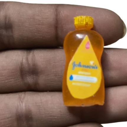 Detailed Johnson's Baby Oil dollhouse miniature bottle, a perfect 1:12 scale replica product for nursery.
