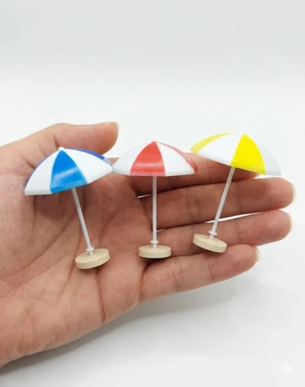 Charming miniature beach umbrella dollhouse figurine, a perfect product for adding summer to any tiny scene.