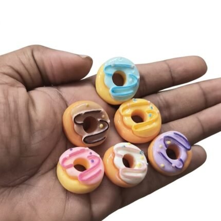 Highly detailed, realistic miniature donut product, handcrafted for dollhouses, dioramas, collectors.