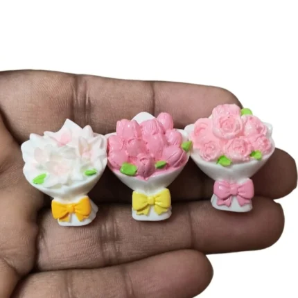 Set of three miniature flower bouquets with flat backs, a versatile product for dollhouse crafts.