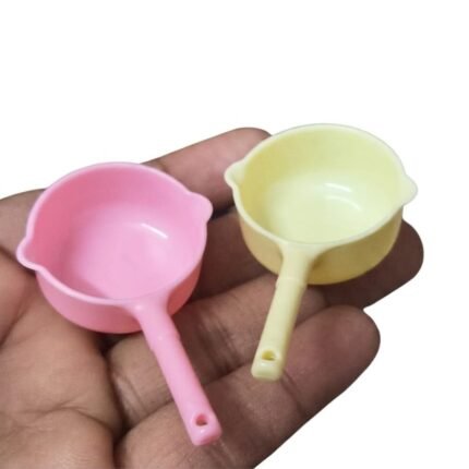 Detailed miniature saucepan, a perfect dollhouse kitchen product for collectors, adding realism.
