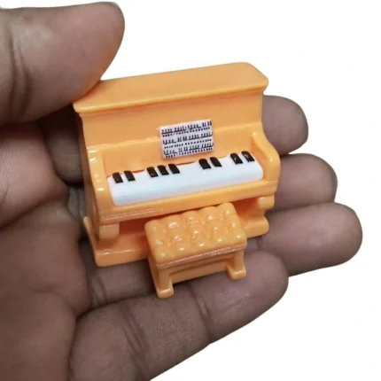 Detailed miniature upright piano and matching bench, a beautiful dollhouse furniture product.