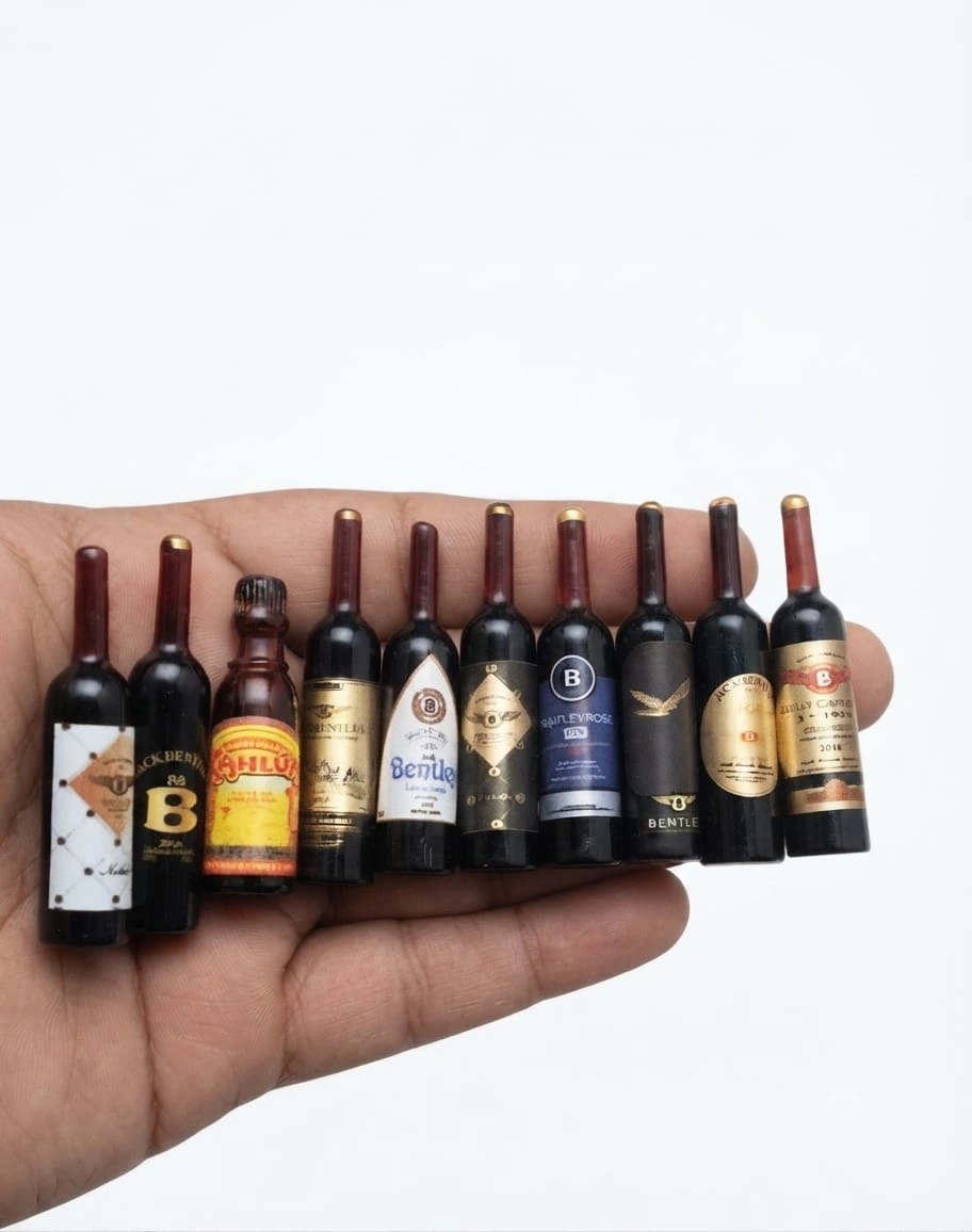 Miniature-Wine-and-Liquor-Bottle-Set-of-3-Random A random set of three highly detailed miniature liquor bottles, perfect for any dollhouse or diorama product scene.