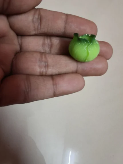 This product is a lifelike miniature cabbage figurine, perfect for dollhouse garden or market scenes.