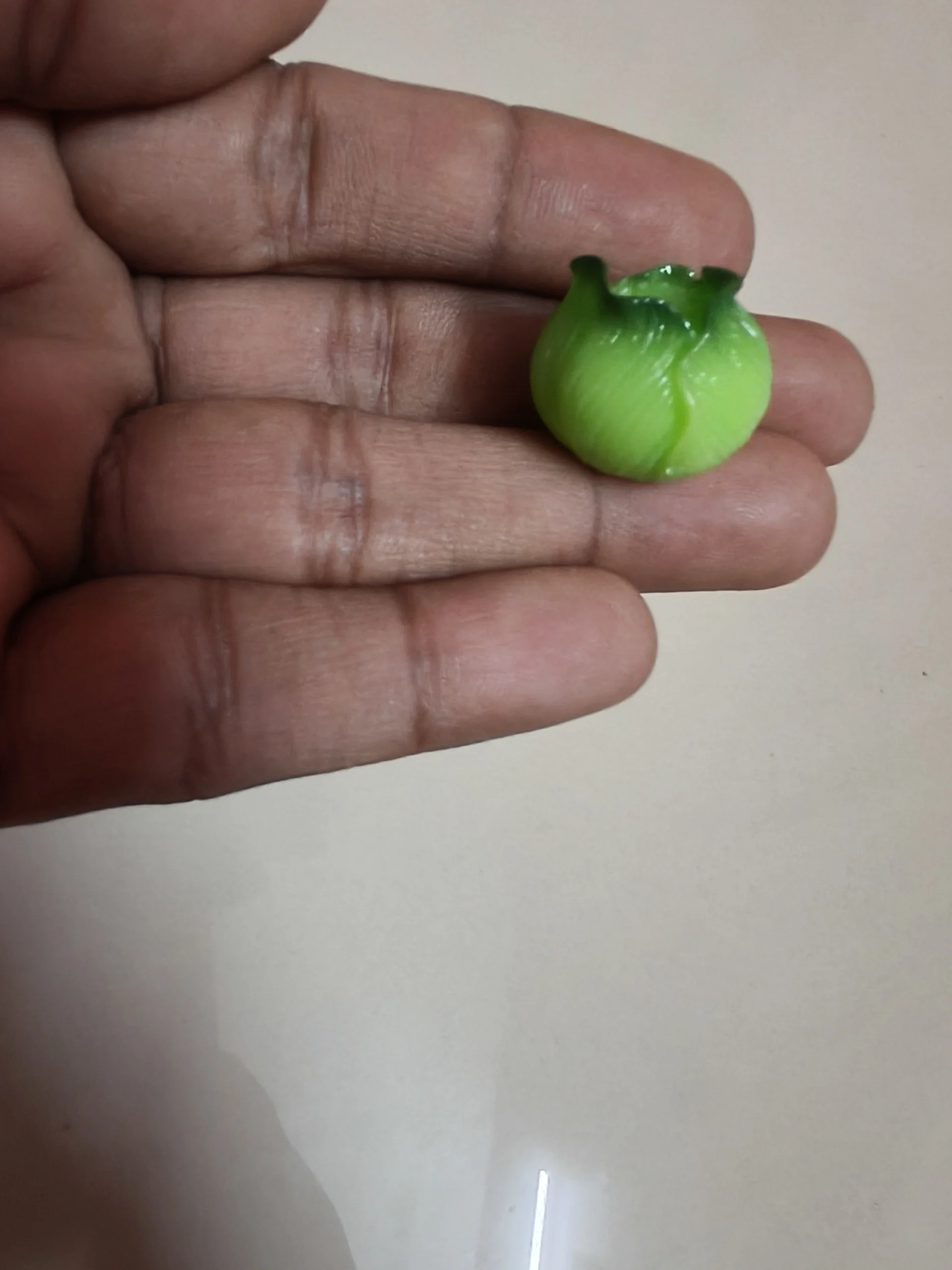 Miniature-fruits-and-vegetables-12 This product is a lifelike miniature cabbage figurine, perfect for dollhouse garden or market scenes.