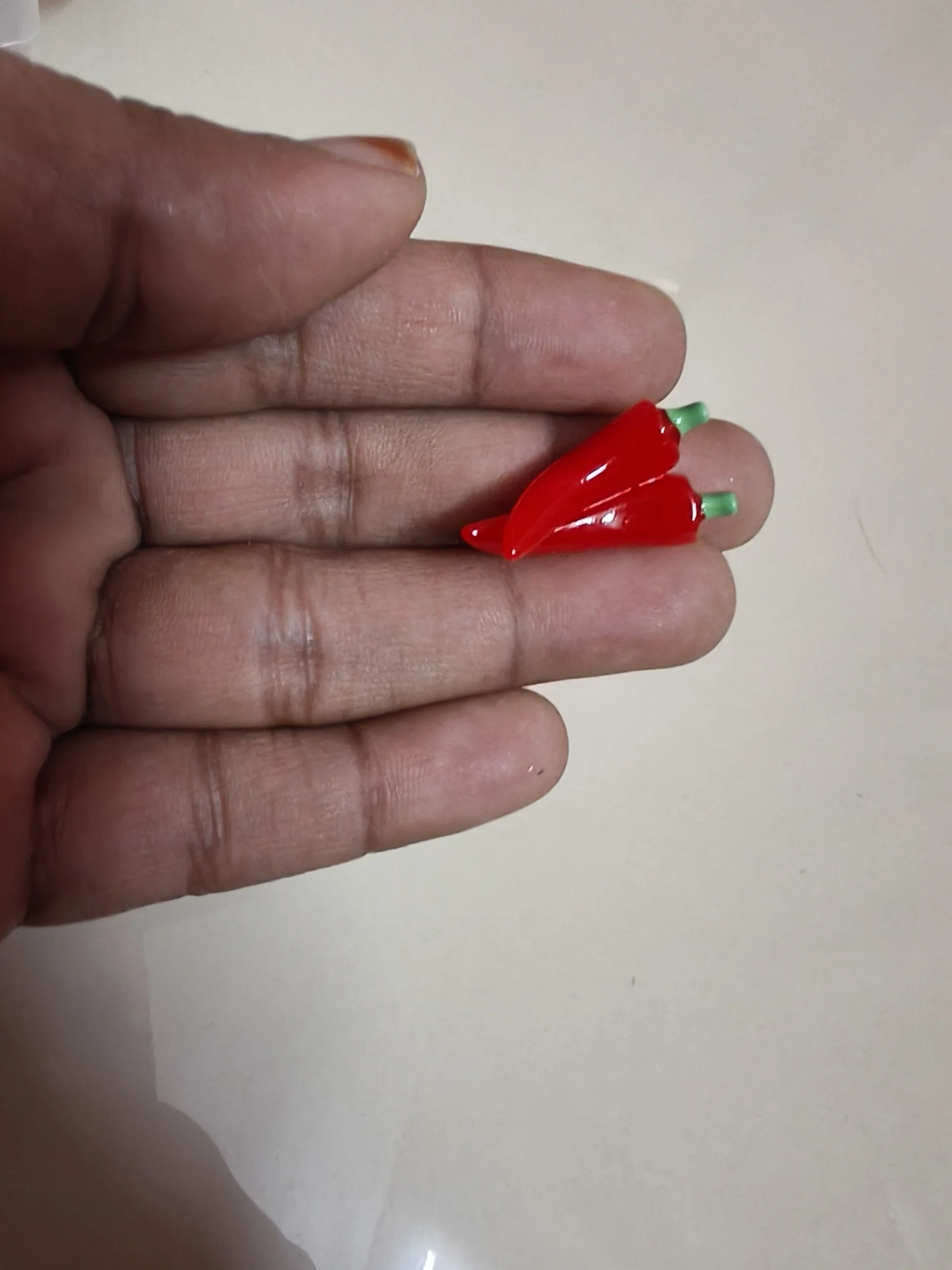 Miniature-fruits-and-vegetables-14 Realistic miniature red chili peppers figurine set of two, a detailed product for dollhouse kitchens.