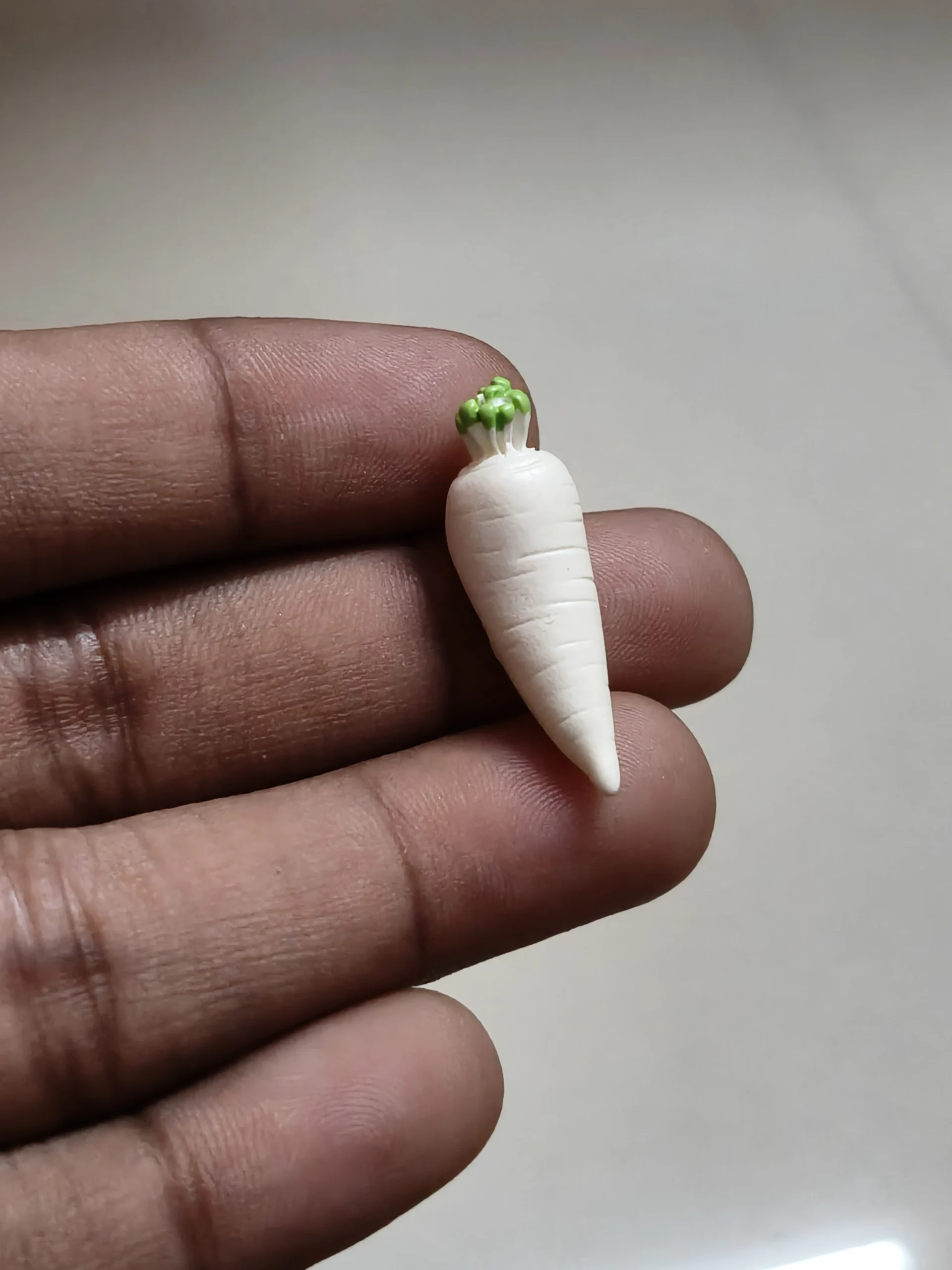 Miniature-fruits-and-vegetables-27 Detailed miniature white radish daikon figurine, a realistic product for dollhouse or miniature food displays.