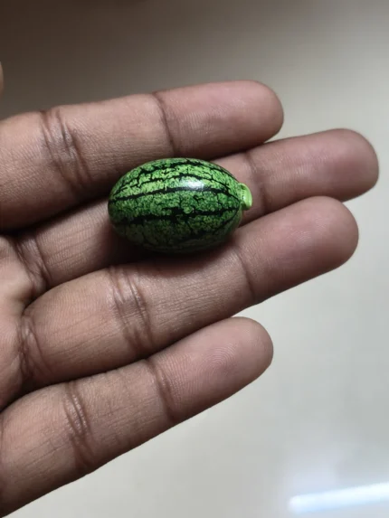 Highly detailed, realistic miniature watermelon fruit figurine product for dollhouse scenes or diorama.