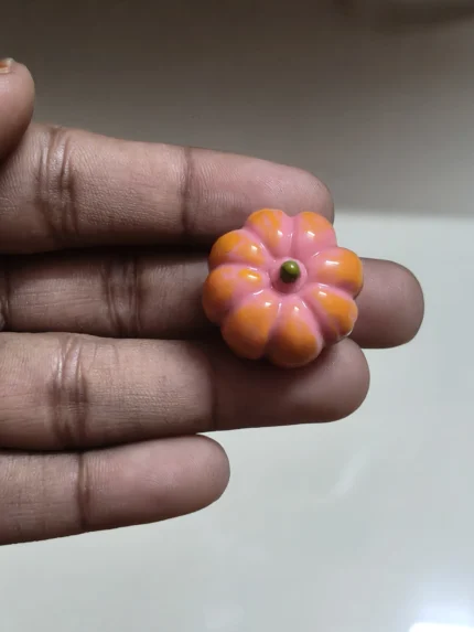 Charming miniature orange pumpkin figurine, a perfect product for dollhouse or miniature display.