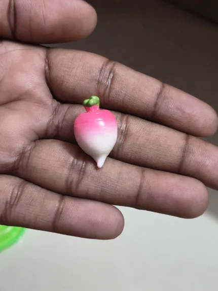 Miniature pink radish vegetable figurine product, perfect for dollhouse or diorama garden charm.