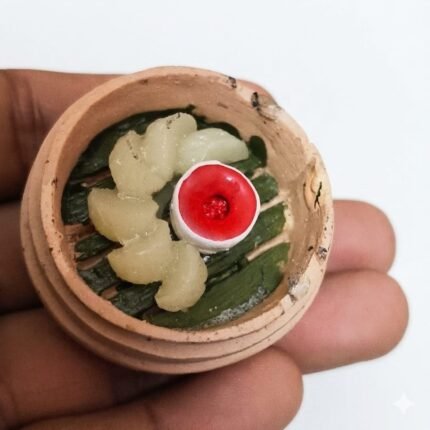 Handcrafted momos miniature fridge magnet product, featuring steamed dumplings and dipping sauce for kitchen decor.