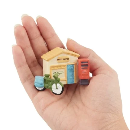Detailed Post Office Building Miniature Set product with bicycle and classic red postbox.