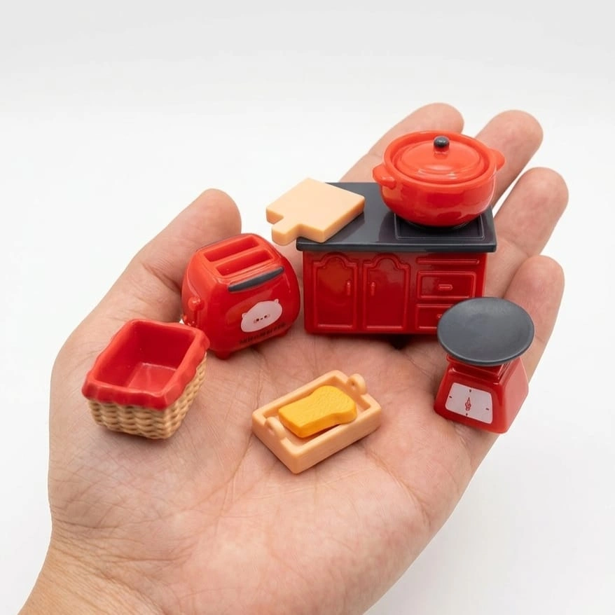 Red-Kitchen-Accessories-Miniature-Set A delightful product, a miniature red kitchen accessories set, perfect for dollhouse scenes and collectors.