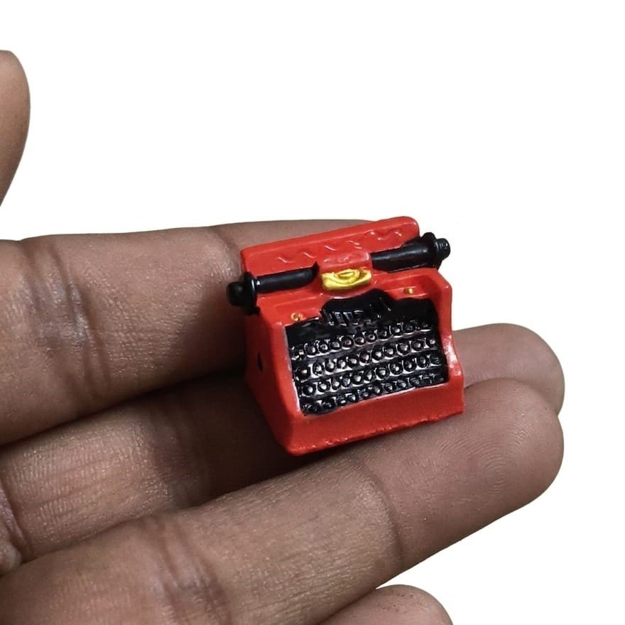 Red-Vintage-Typewriter-Miniature-Figurine Detailed red vintage typewriter miniature figurine product, ideal for office, dollhouse, or unique collectible.