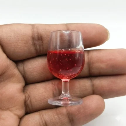 Product: Beautifully crafted red wine glass dollhouse miniature figurine, perfect for any miniature scene.