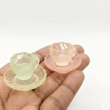 Charming resin miniature teacup and saucer set of 2, a highly detailed product for dollhouse displays.
