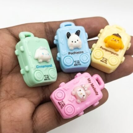 Charming Sanrio-inspired character suitcase miniature figurine, a delightful product for dollhouse collectors.