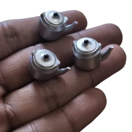 Beautifully detailed silver miniature kettle figurine product, ideal for dollhouse displays and collectors.