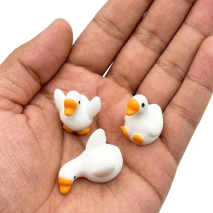 White duck miniature figurine, randomly selected, ideal for miniature scene or dollhouse product display.