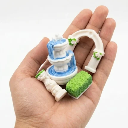 White miniature garden fountain arch and topiary set of four. This product is perfect for dollhouse landscapes.