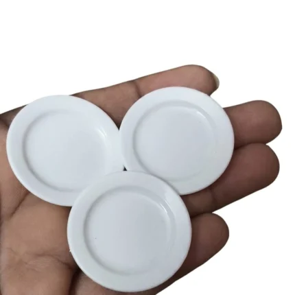 Beautifully crafted white fiber miniature dinner plate product, perfect dollhouse accessory.