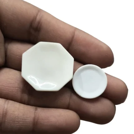 Detailed close-up of the white miniature plate set of 2 dollhouse dishes, a charming product.