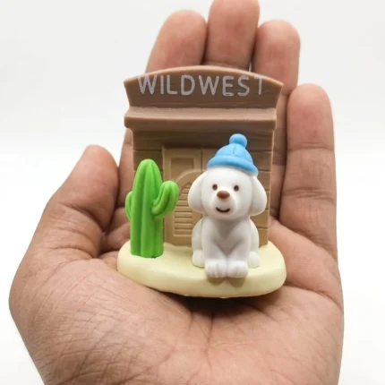 Detailed Wild West saloon dog miniature figurine with cactus. This product is ideal for collectors.