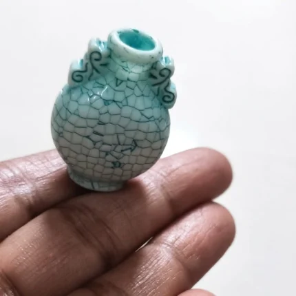 Blue miniature vase product with crackle glaze, ideal for dollhouse or miniature scene enhancement.