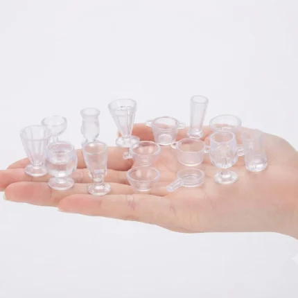 Clear plastic miniature kitchenware set for dollhouse kitchens, adding realistic detail to your product scene.