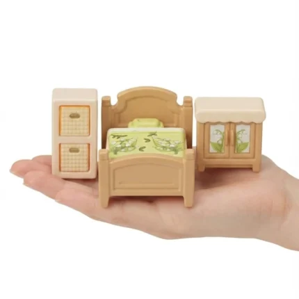 Dollhouse miniature bedroom furniture set with floral bed and accessories. A charming product for collectors.