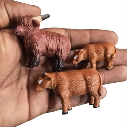 Detailed product image of a charming set of three Highland cattle miniature figurines for collectors.