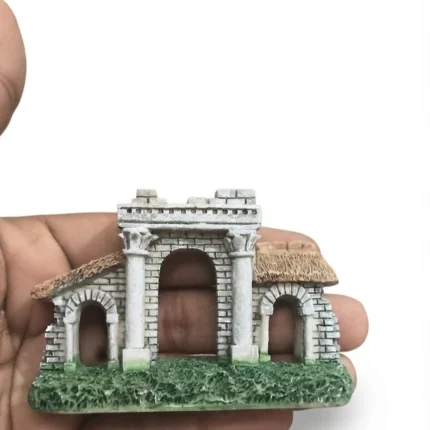 Detailed miniature ancient stone ruins archway figurine product for diorama or display.